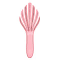 Pale pink curl detangler hair brush with flexible cushion and round bristle tips
