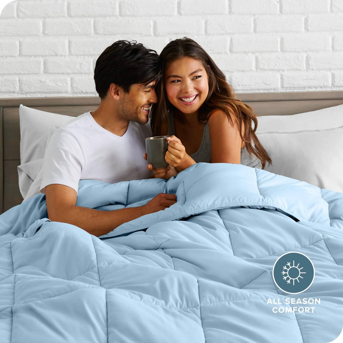Light blue all-season comforter with two pillow shams, quilted baffles