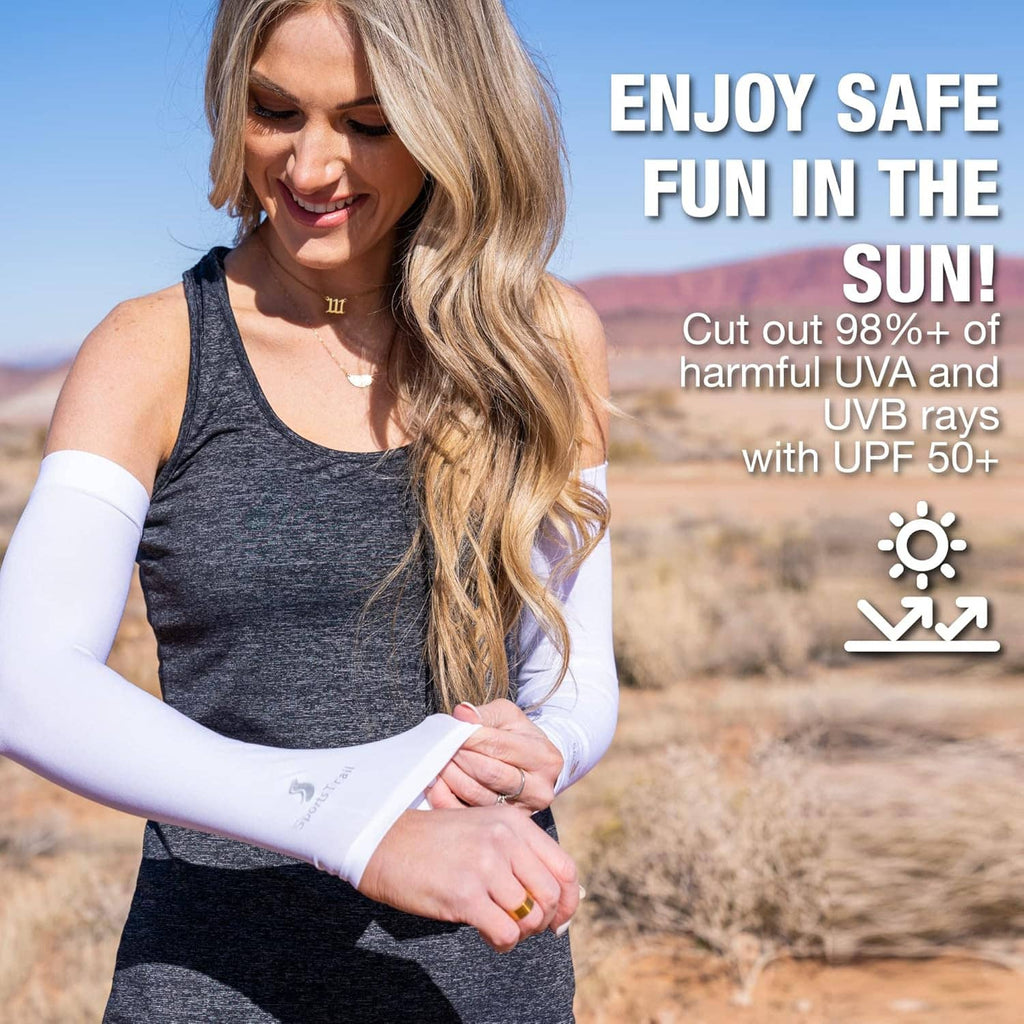 White arm sleeves on a woman, forearm coverage with a secure wrist fit