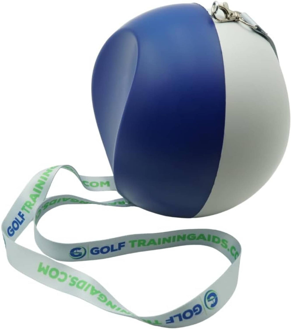 Compression ball golf swing trainer with navy cap, light gray ball, and long strap