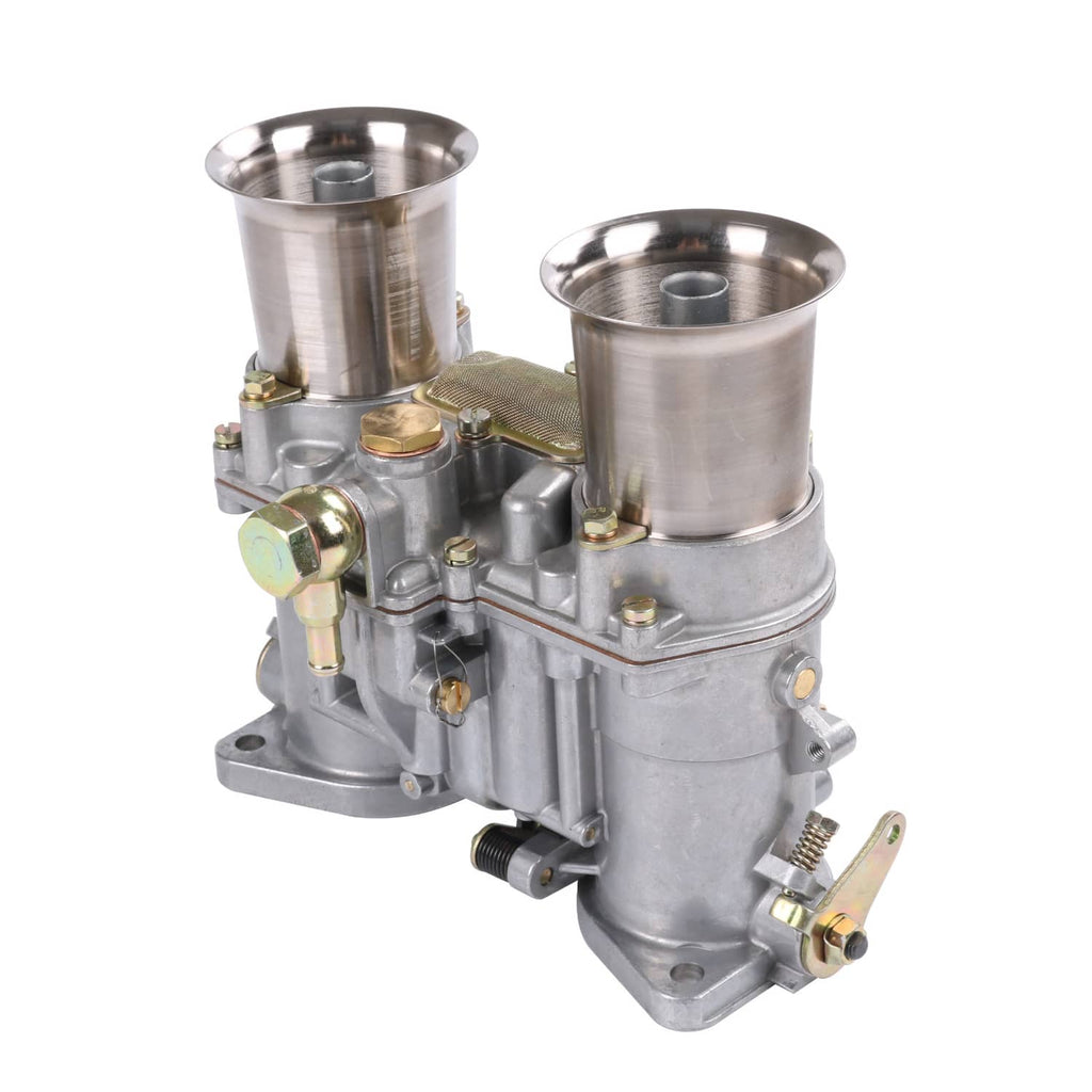 Side view of dual carburetor with two intake stacks and gold-colored fittings