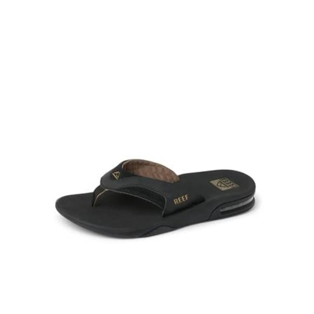 Black flip flops with brown textured footbed and thong strap