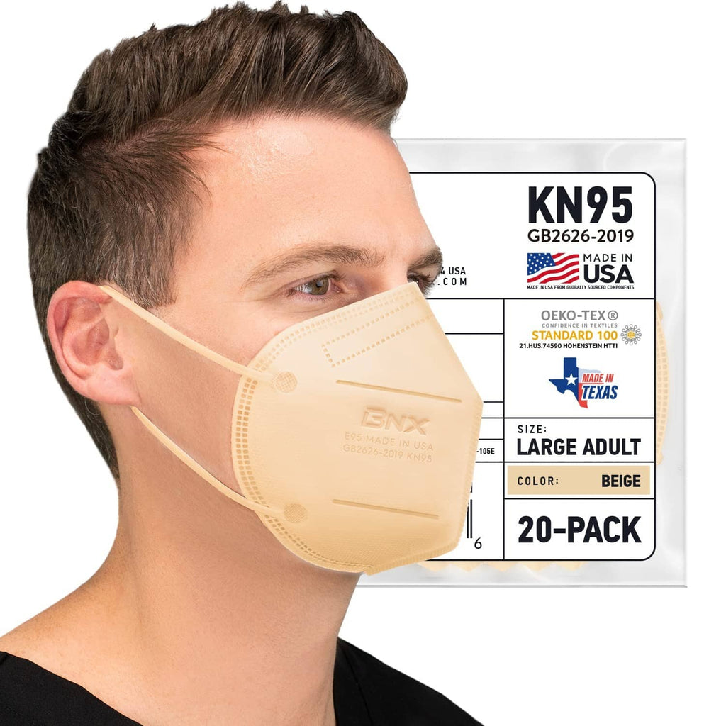 Large adult beige KN95 face mask on man, side profile with adjustable ear loops