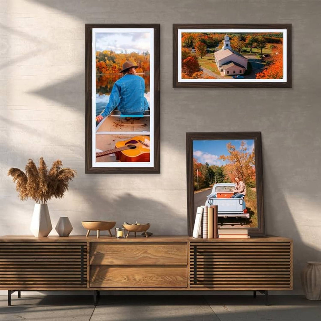 Set of dark wood picture frames with real glass, displaying landscape photos
