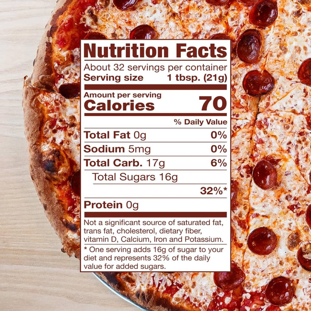 Nutrition Facts panel for hot honey condiment beside pizza