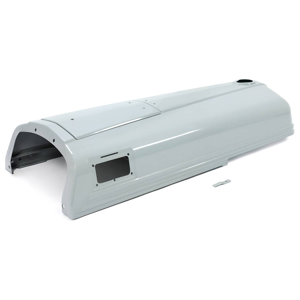 Gray tractor engine hood with large rectangular battery access opening
