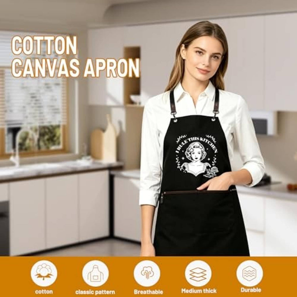 Black cotton canvas apron with chef graphic on chest and neck strap hardware
