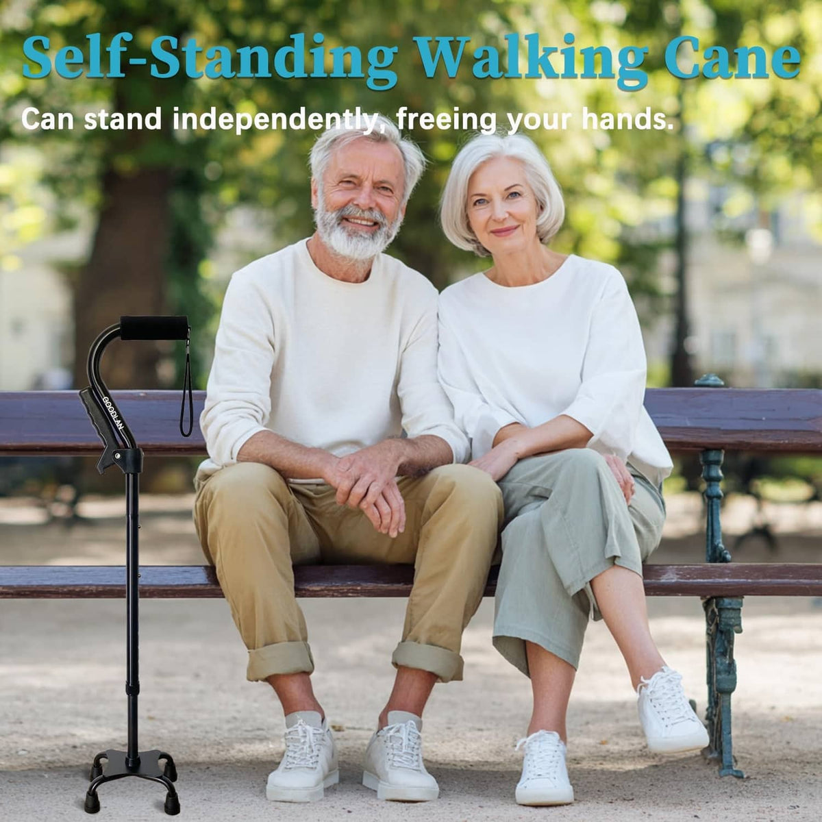 Self-standing black quad walking cane with four-leg base and hanging strap