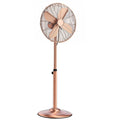 Rose gold metal pedestal oscillating fan with circular grille and 4 blades