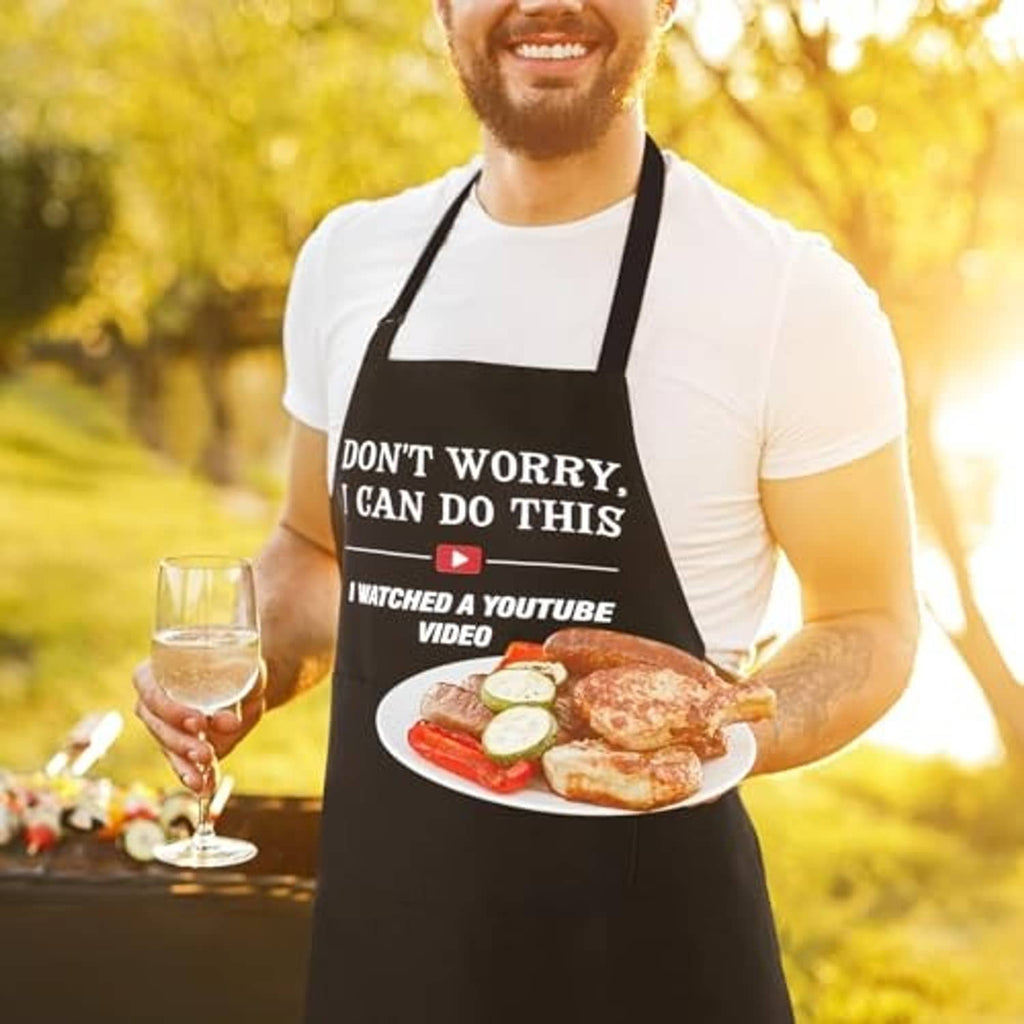 Black cooking apron with “Don't worry, I can do this” and two side pockets