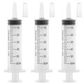 60 ml plastic syringe with cap, clear barrel and black measurement markings