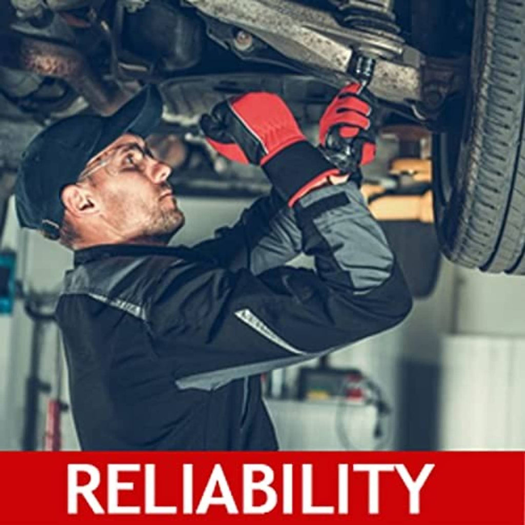 Mechanic installing a greasable ball joint at the front suspension under a vehicle