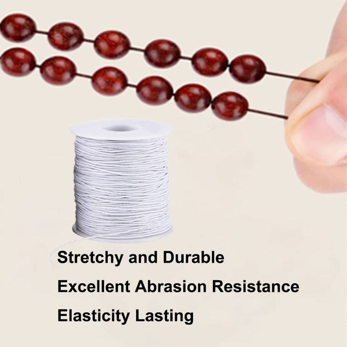 White elastic string spool with loose cord strand held near beads
