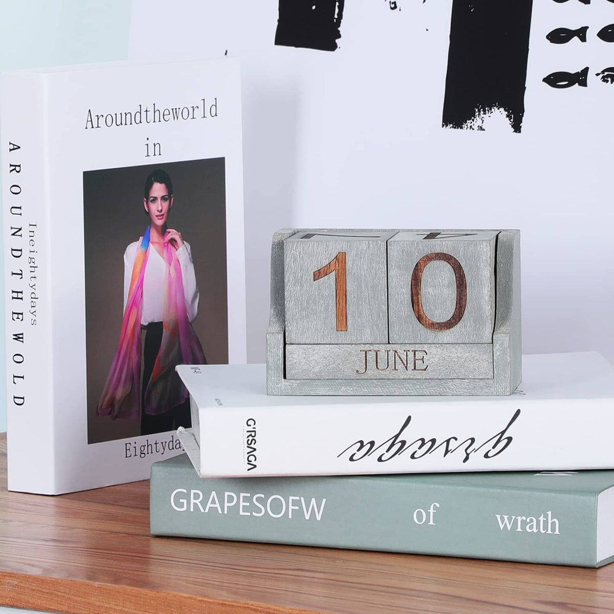 Grey desk calendar blocks showing 1 and 0 with JUNE label