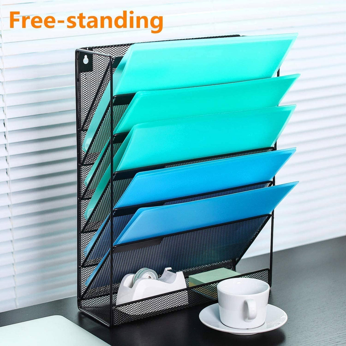 Free-standing wall organizer with mesh sides, multiple teal trays, and bottom storage tray