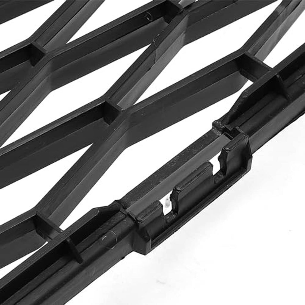 Close-up of black plastic mounting clips on diamond-pattern grille frame
