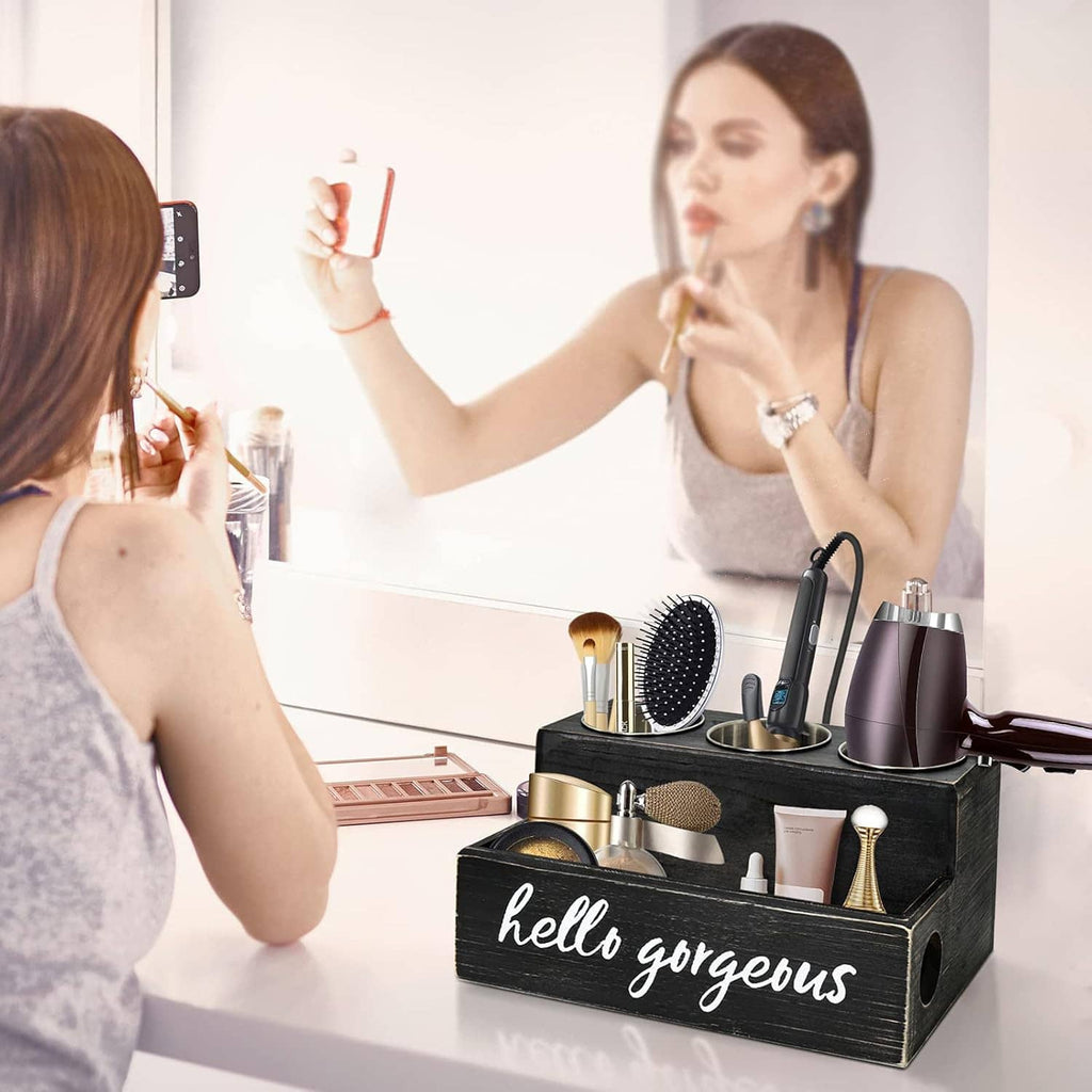 Black countertop hair tool holder with brushes, blow-dryer, and styling bottles