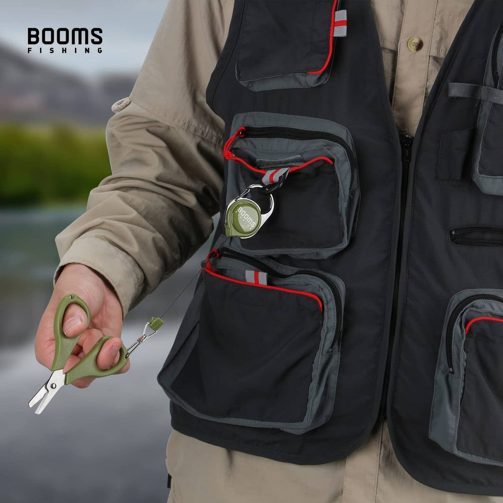Retractable fly tool retractor with green button and metal scissors