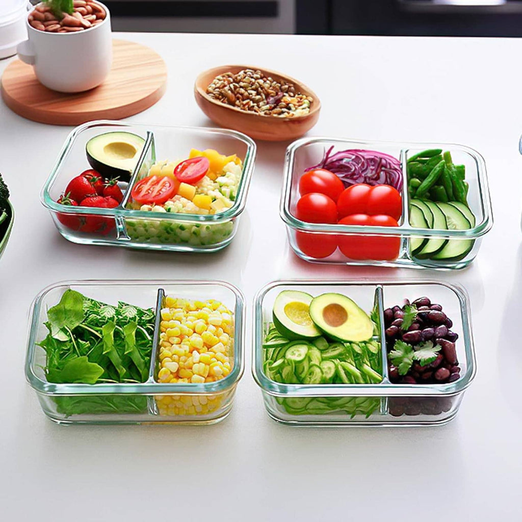 2-compartment clear glass meal prep bento with teal lid, filled with mixed vegetables