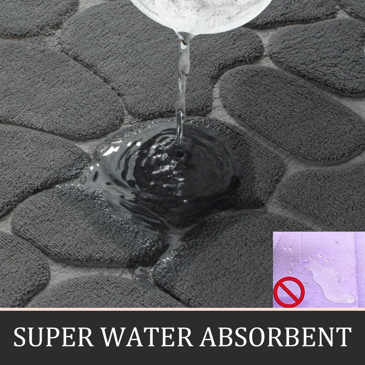 Dark grey bath rug mat showing water beading on pebble-texture surface