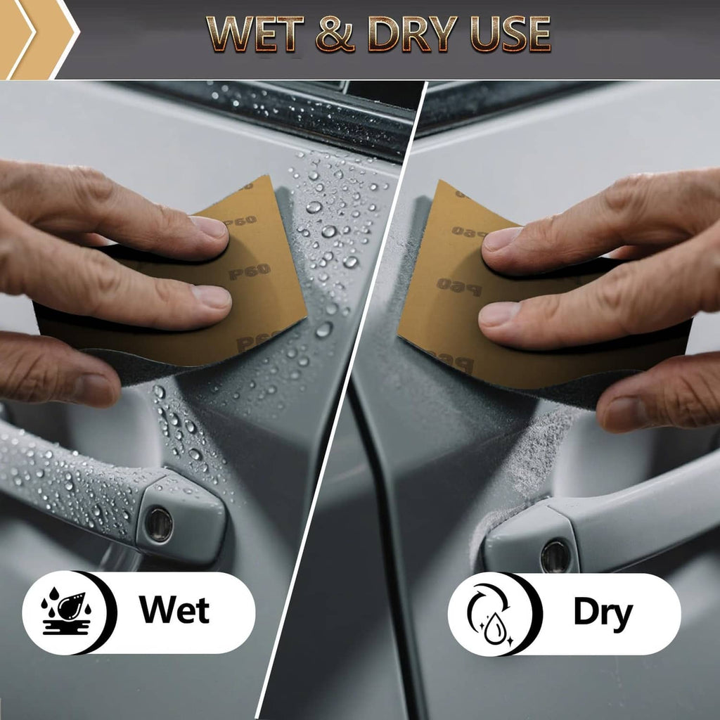 Black wet and dry sanding sheet in use on a car panel, water droplets