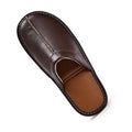 Dark brown leather slip-on slippers with open top and stitched edge trim