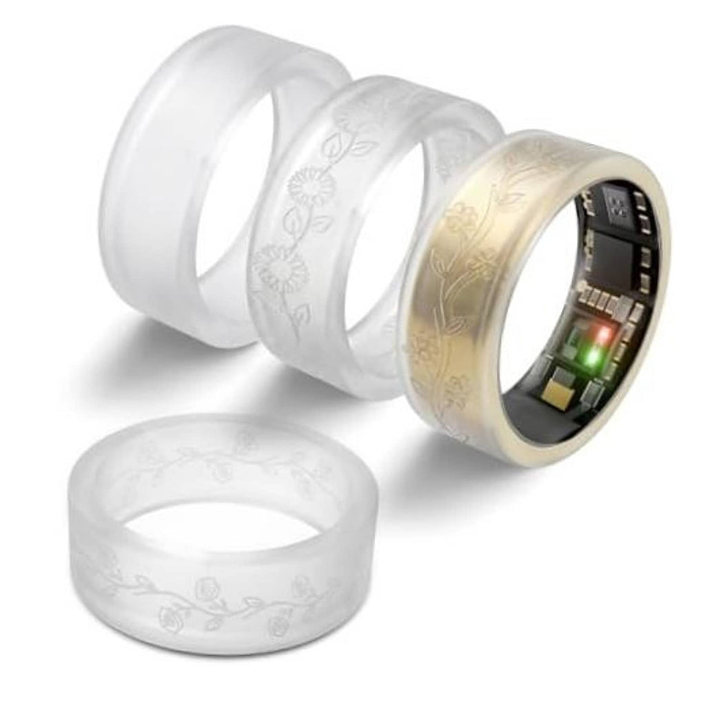 Set of transparent and rose silicone flower ring covers with engraved floral patterns.