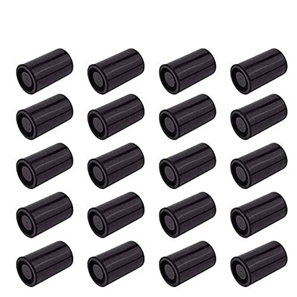 Set of black plastic film canisters, cylindrical with round end caps