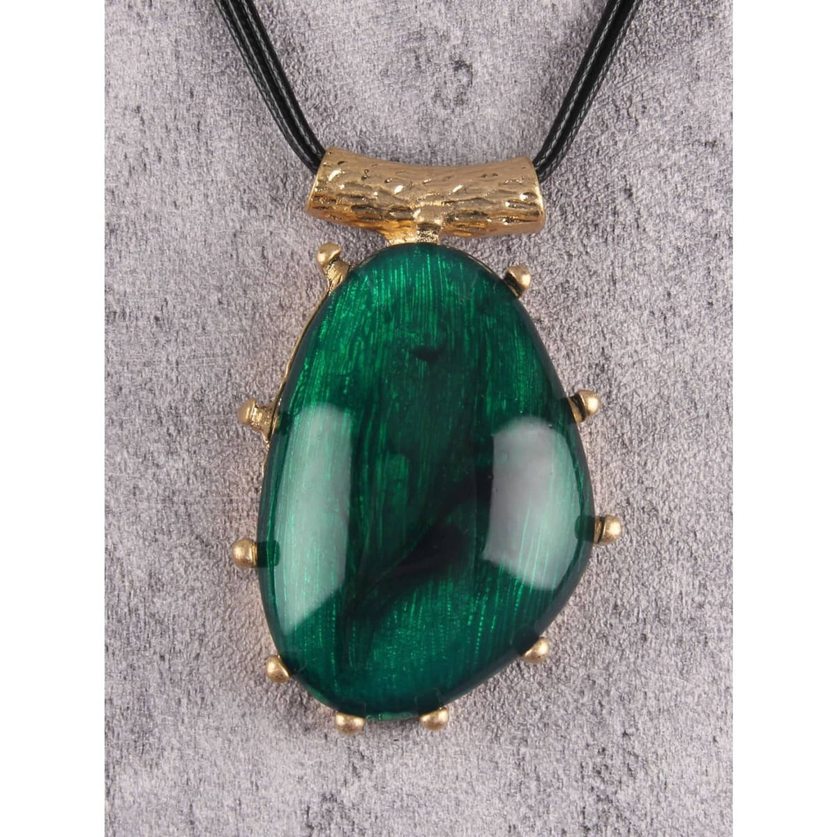 Green teardrop statement pendant necklace with black faux leather cord and gold stud trim