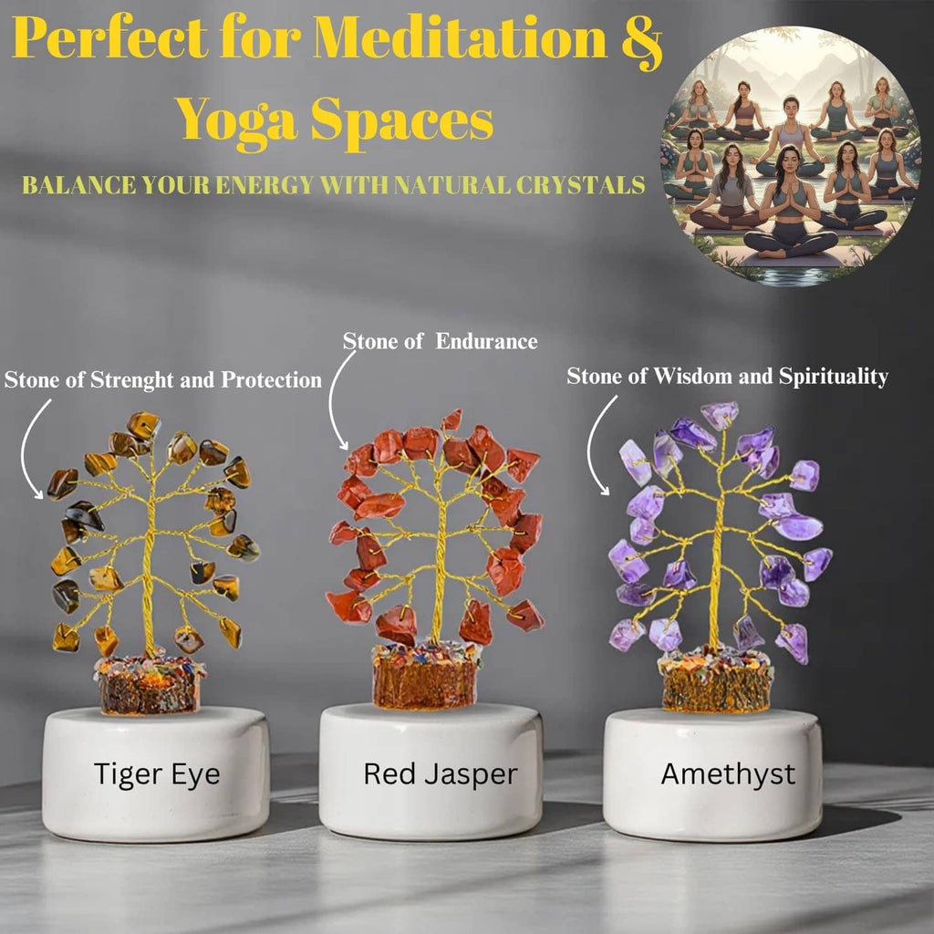 Three gemstone crystal trees on white pedestals: tiger eye, red jasper, and amethyst.