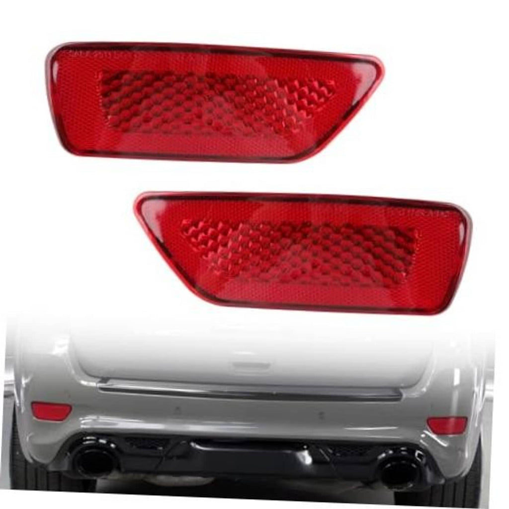 Red rear bumper reflector lamp with textured lens, teardrop shape