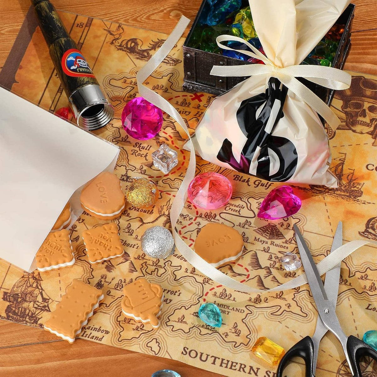 Cream dollar-sign treat bags with white ribbon bows, with party candies visible