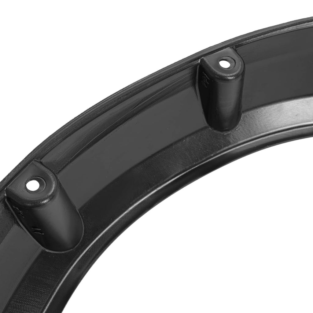 Angle view of black fender flare edge with two mounting standoffs and holes.