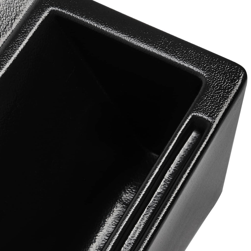 Close-up of black cab caddie corner with large empty tray and edge trim.