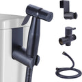 Black handheld bidet sprayer with lever and wall mount, plus braided hose and valve