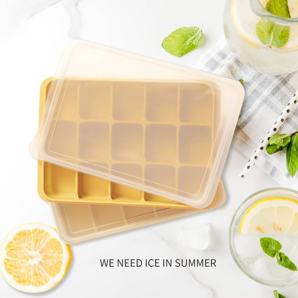 Yellow ice cube tray with clear lid, viewed from above