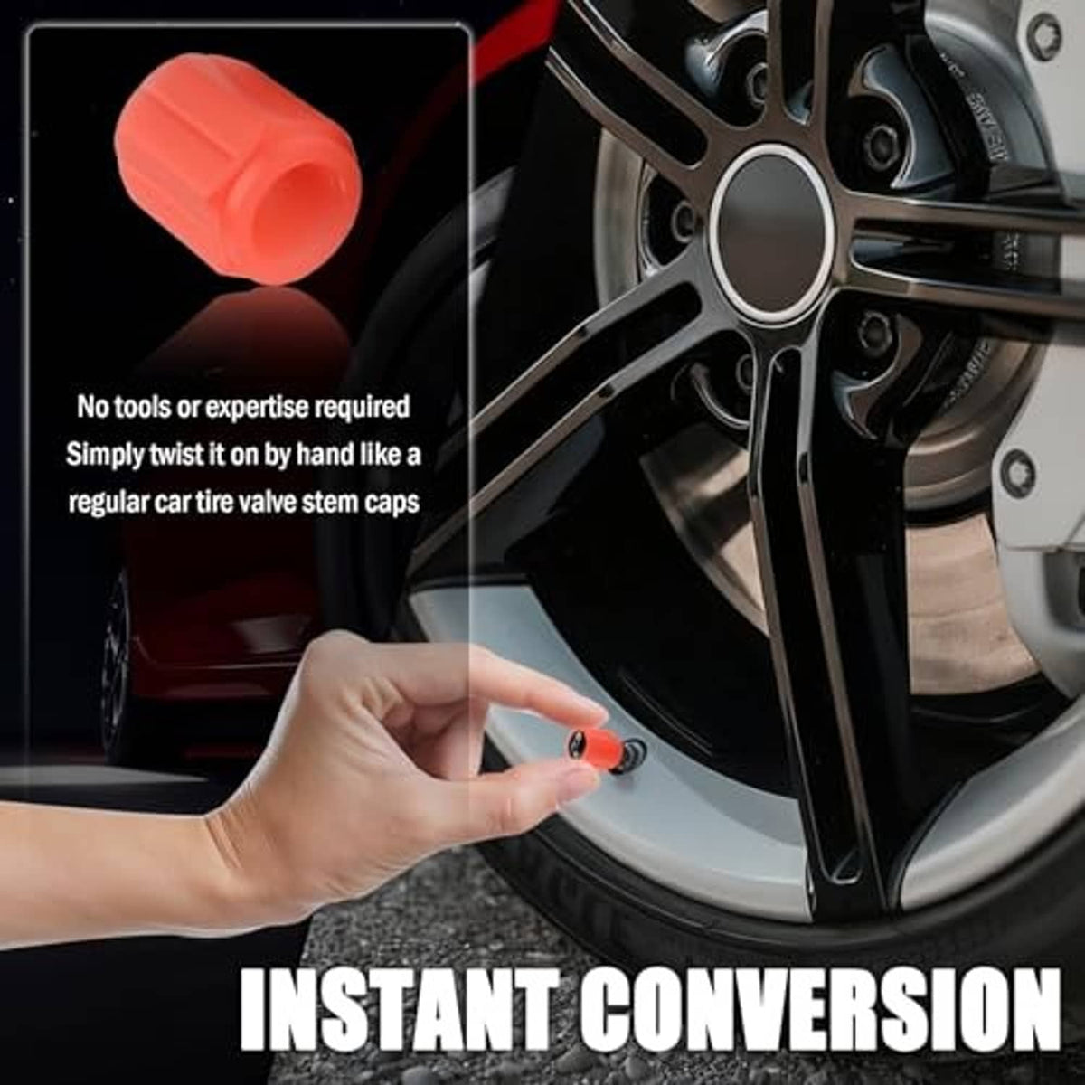 Orange tire valve cap being installed by hand onto a black wheel rim