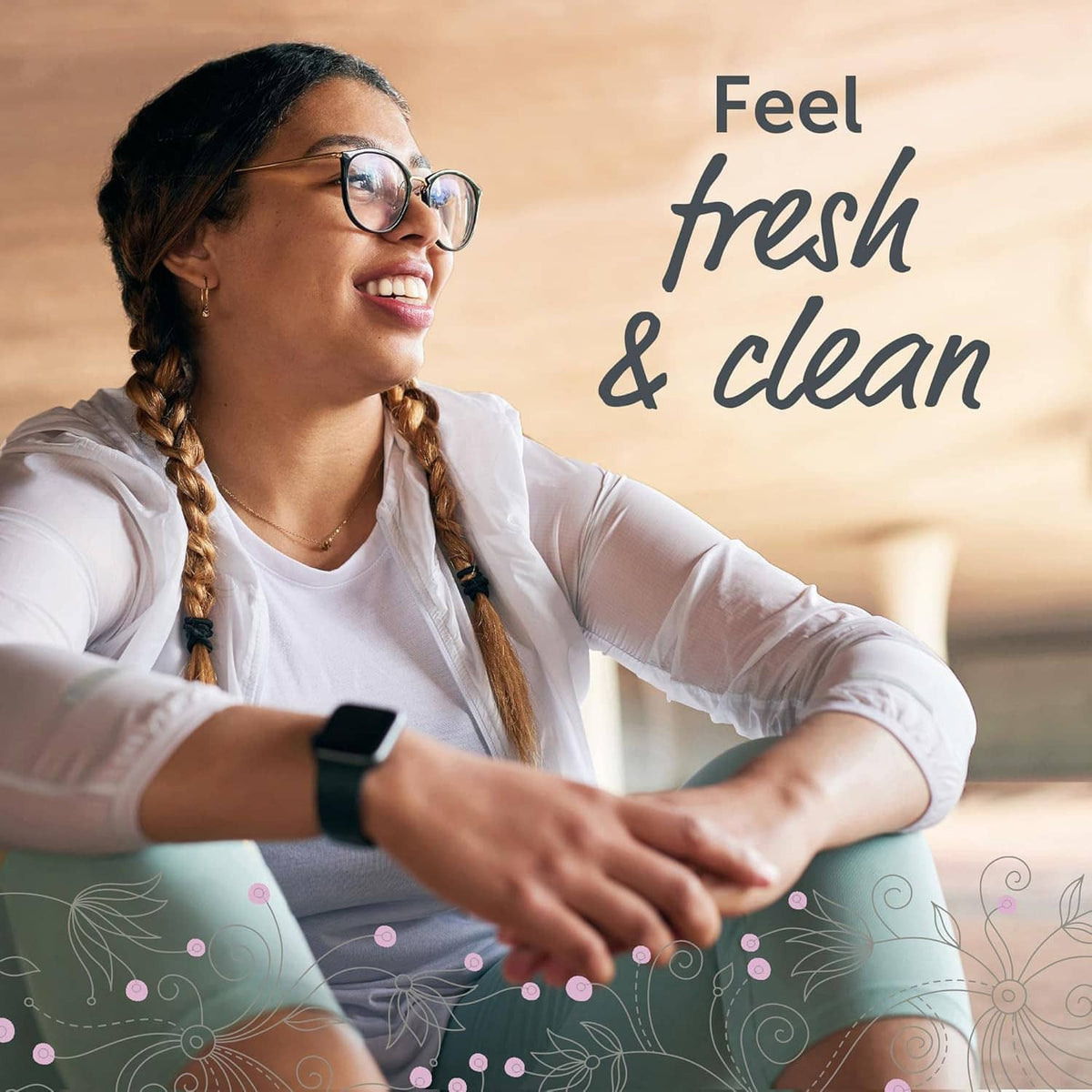 Woman wearing gloves using a douche bottle, smiling with earbud and glasses