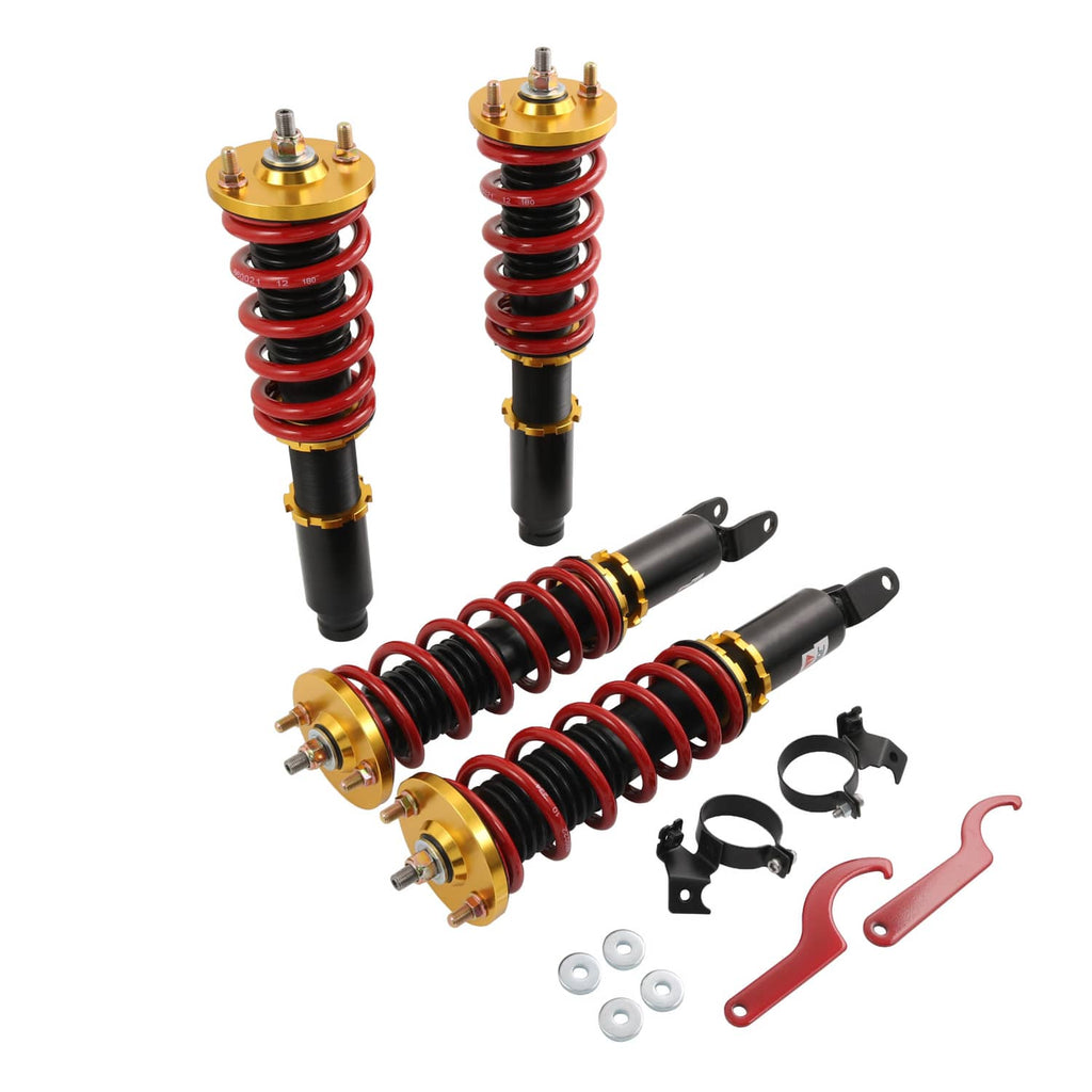 Adjustable coilover struts with red springs, black bodies, and gold top mounts (set).