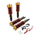 Adjustable coilover struts with red springs, black bodies, and gold top mounts (set).
