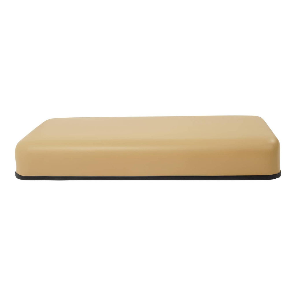 Tan padded seat cushion bottom with black underside edge trim