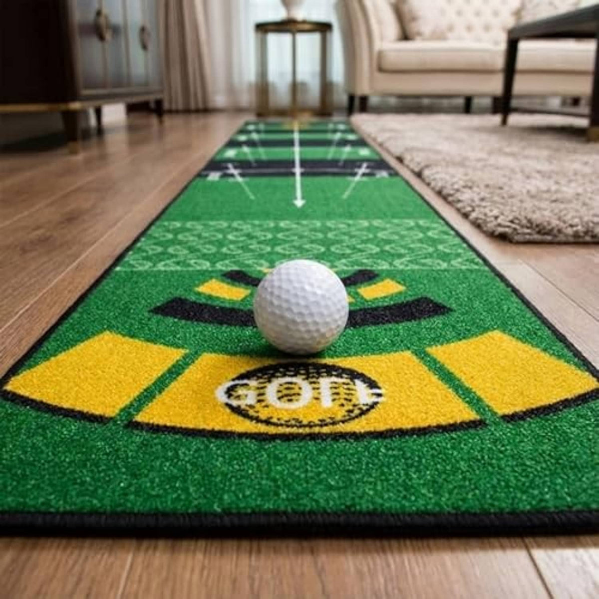 Close-up of green putting mat with yellow target graphic and white golf ball