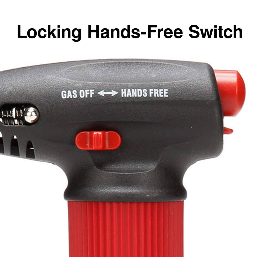 Butane torch lighter close-up of red switch and gray body above ribbed red grip.