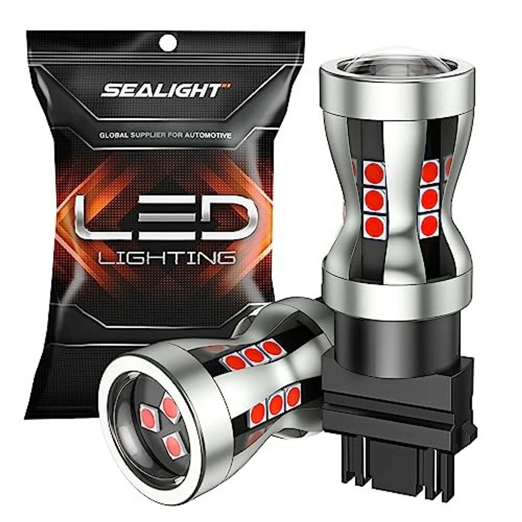 Pair of silver-and-black LED brake light bulbs with red LED dots and black electrical base