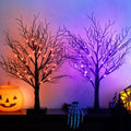 Lighted Halloween decorative tree with purple and orange LED lights, black trunk, base