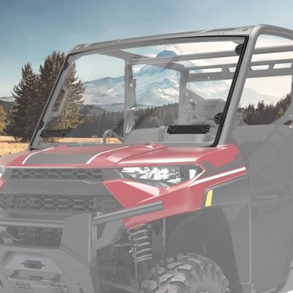 Front UTV windshield with clear panel and black frame on red off-road vehicle