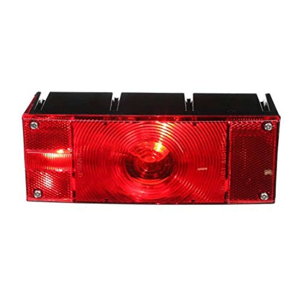 Universal red tail light with black backing, ribbed lens, and side reflectors