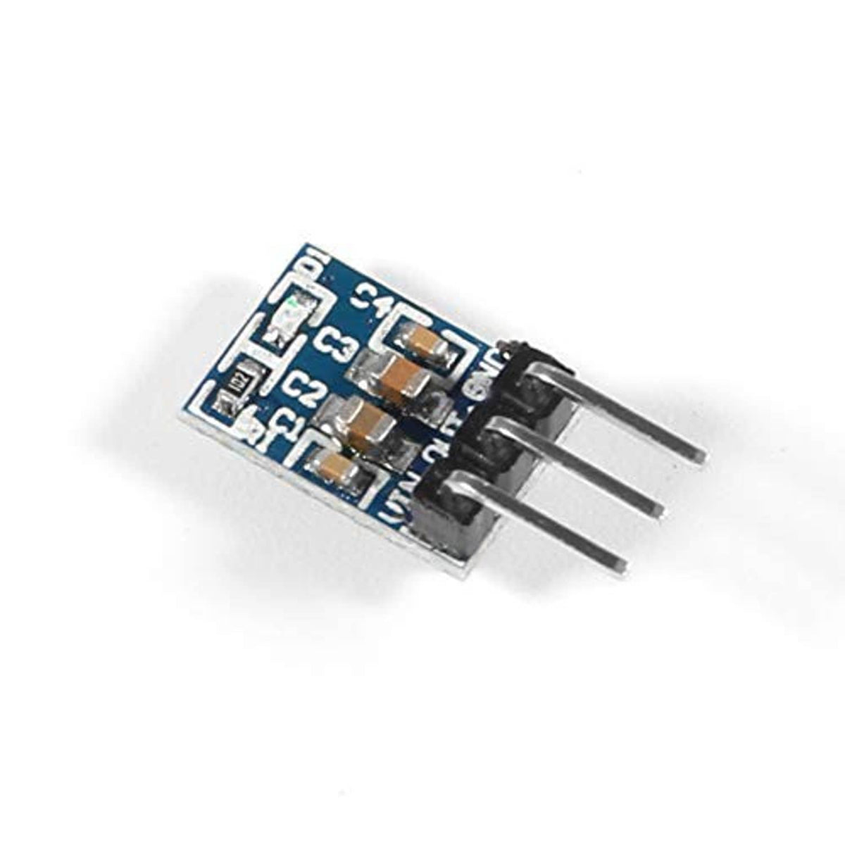 3.3V buck converter module with three pins and blue circuit board