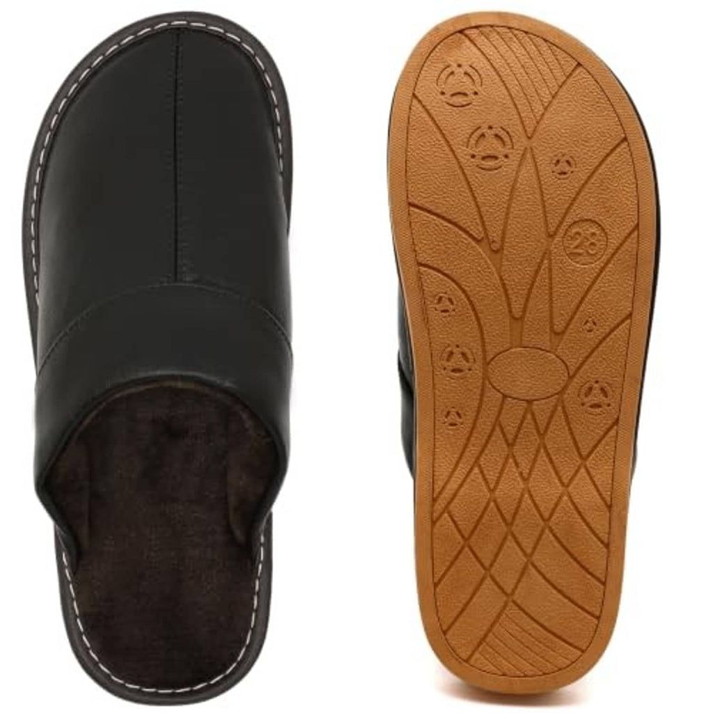 Black leather slippers with fuzzy lining and tan non-slip outsole tread