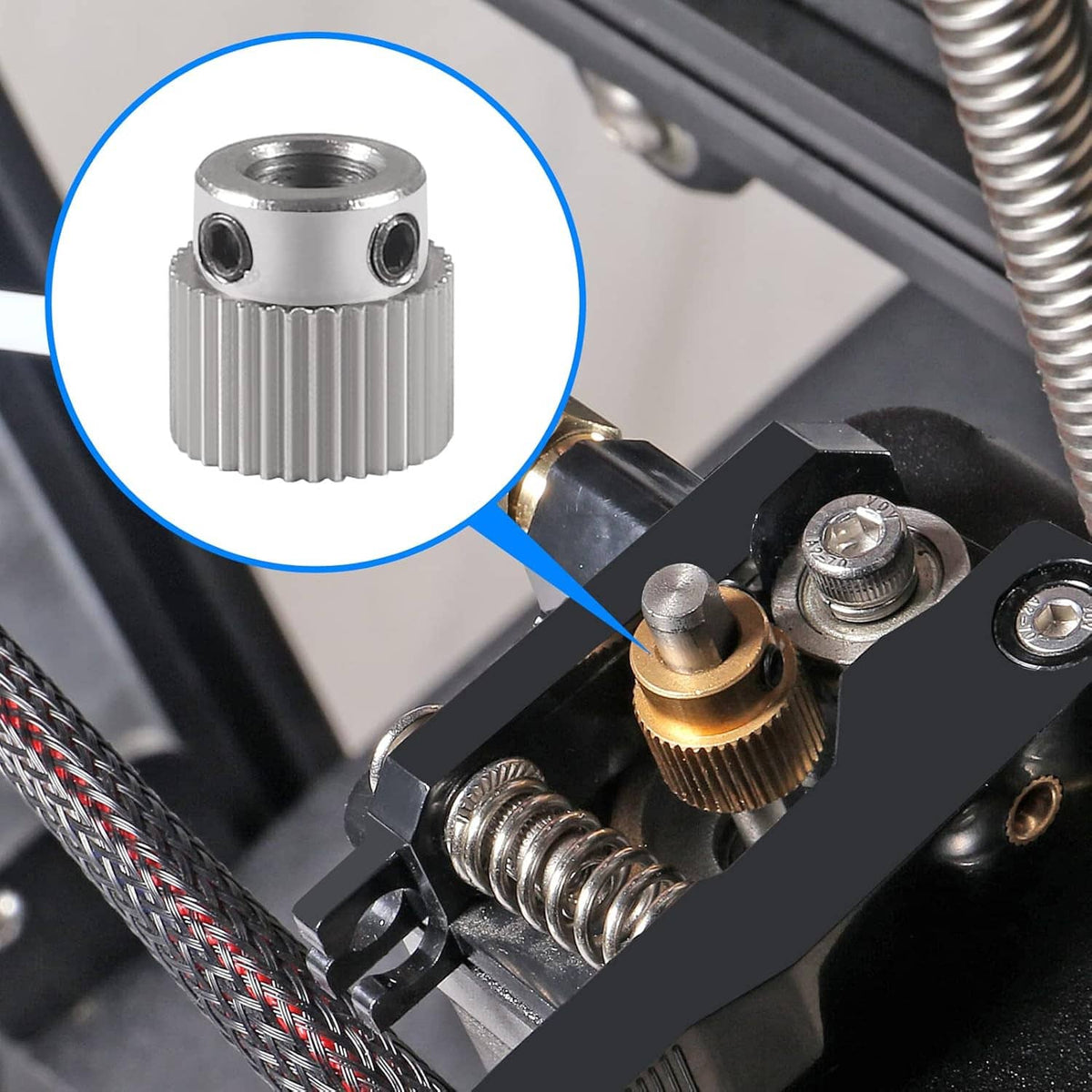 Stainless steel 36-tooth extruder drive gear highlighted on 3D printer assembly